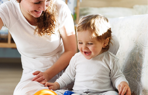 Babysitter playing with child
