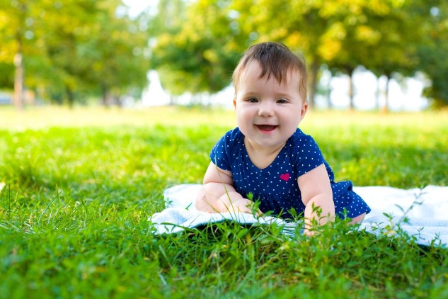 https://media.buzzle.com/media/images-en/photos/human-expressions/babies/1200-55840306-funny-baby-girl-in-garden.jpg